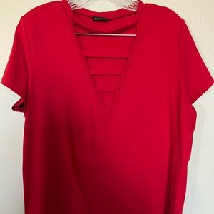 Red top, stretchy material.